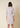 Abito con scollo a cratere in punto Milano e taffetà Memory beige Arese New